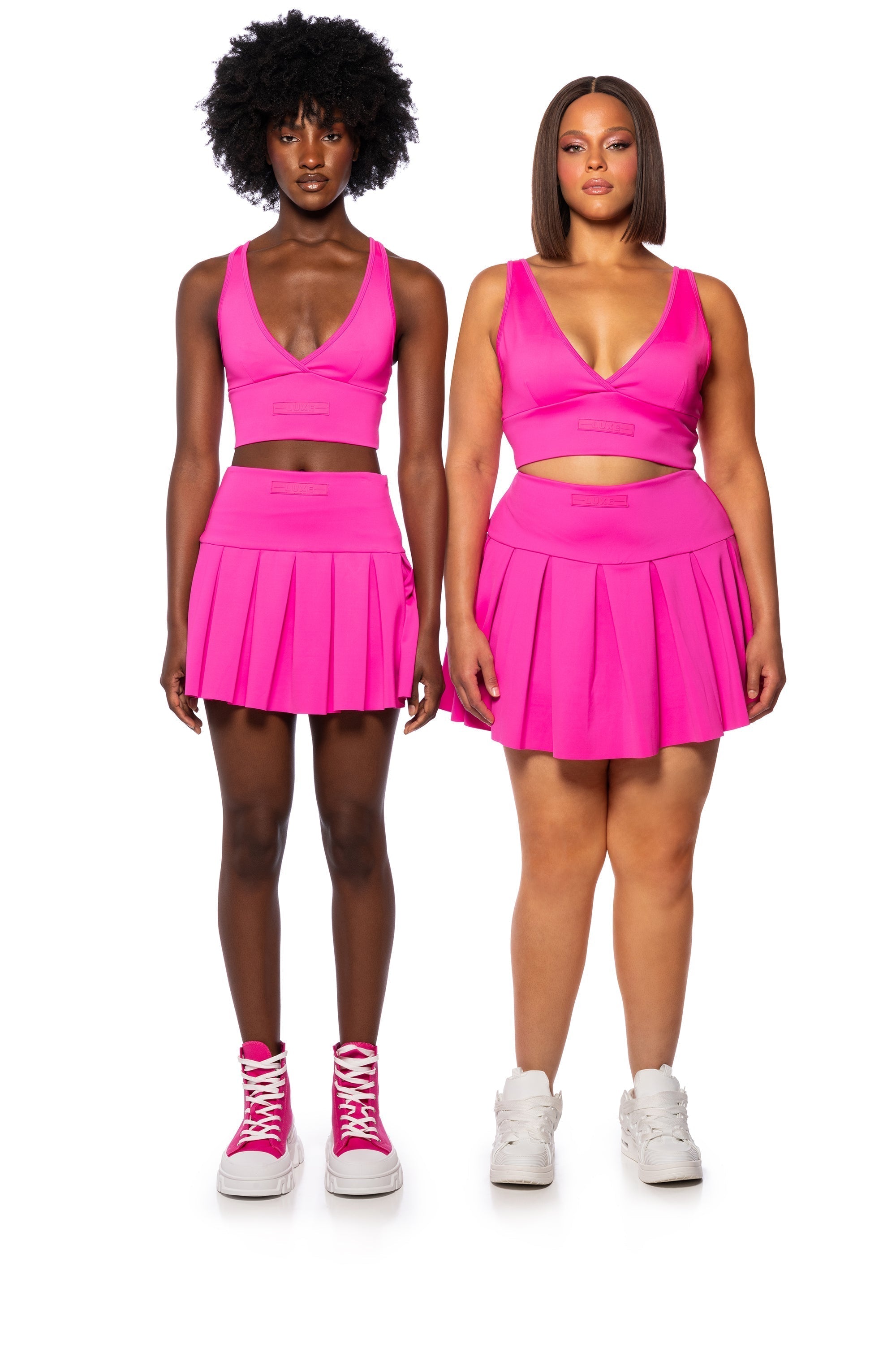 ITS THE PAXTON LUXE PLEATED SKORT IN NEON PINK
