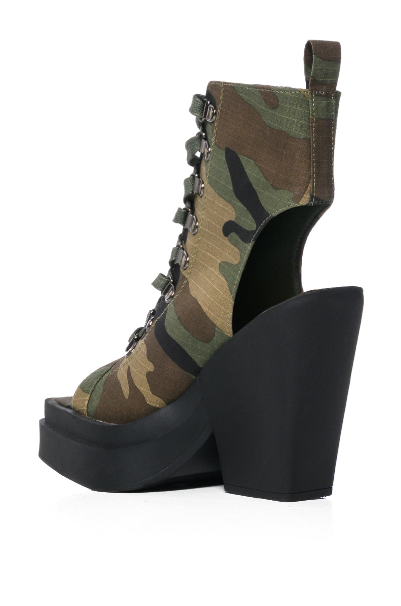 OFF DUTY PEEP TOE BOOTIE IN CAMO
